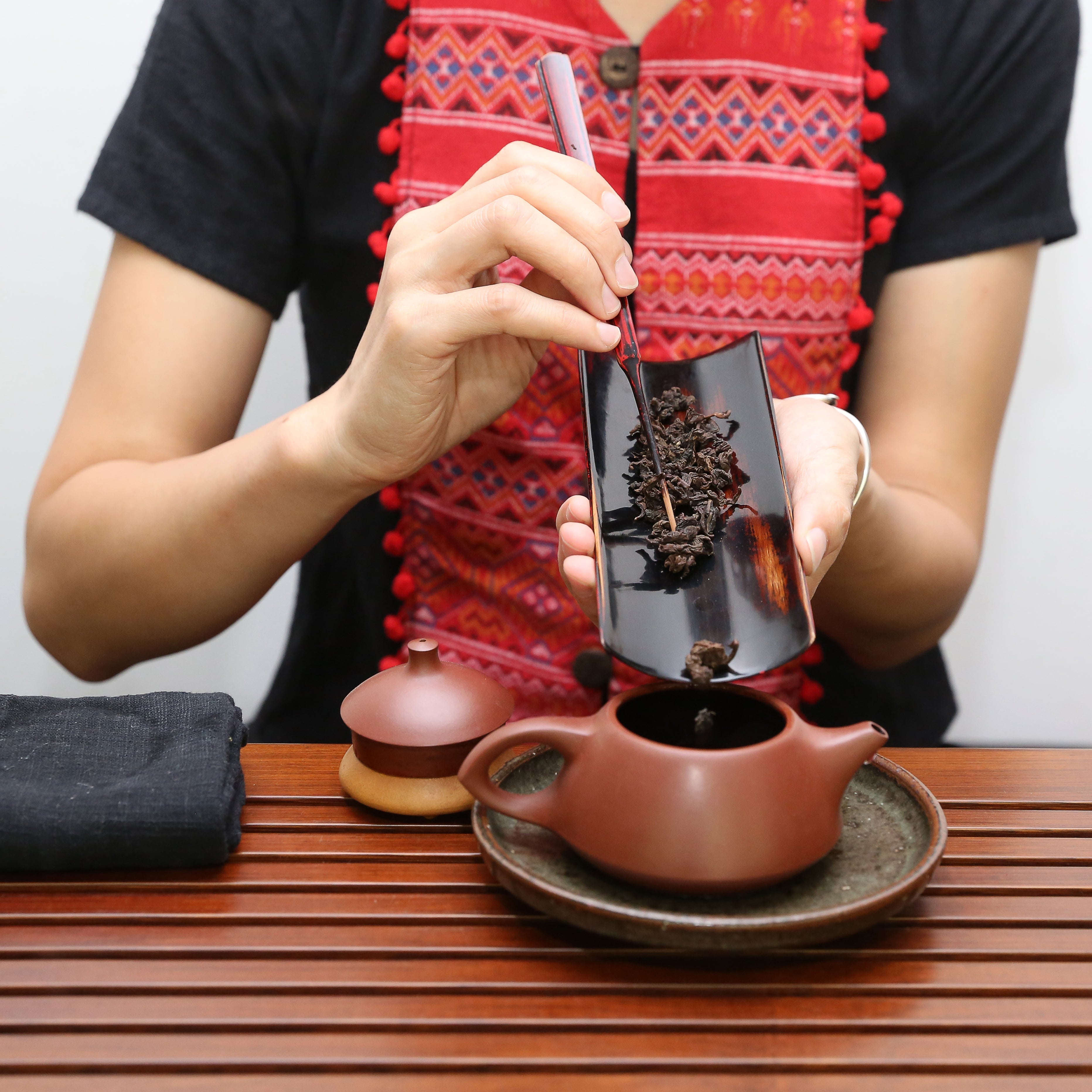 Chinese Tea Preparation. China Tea Ceremony and Culture. Wan Ling preparing puer tea.