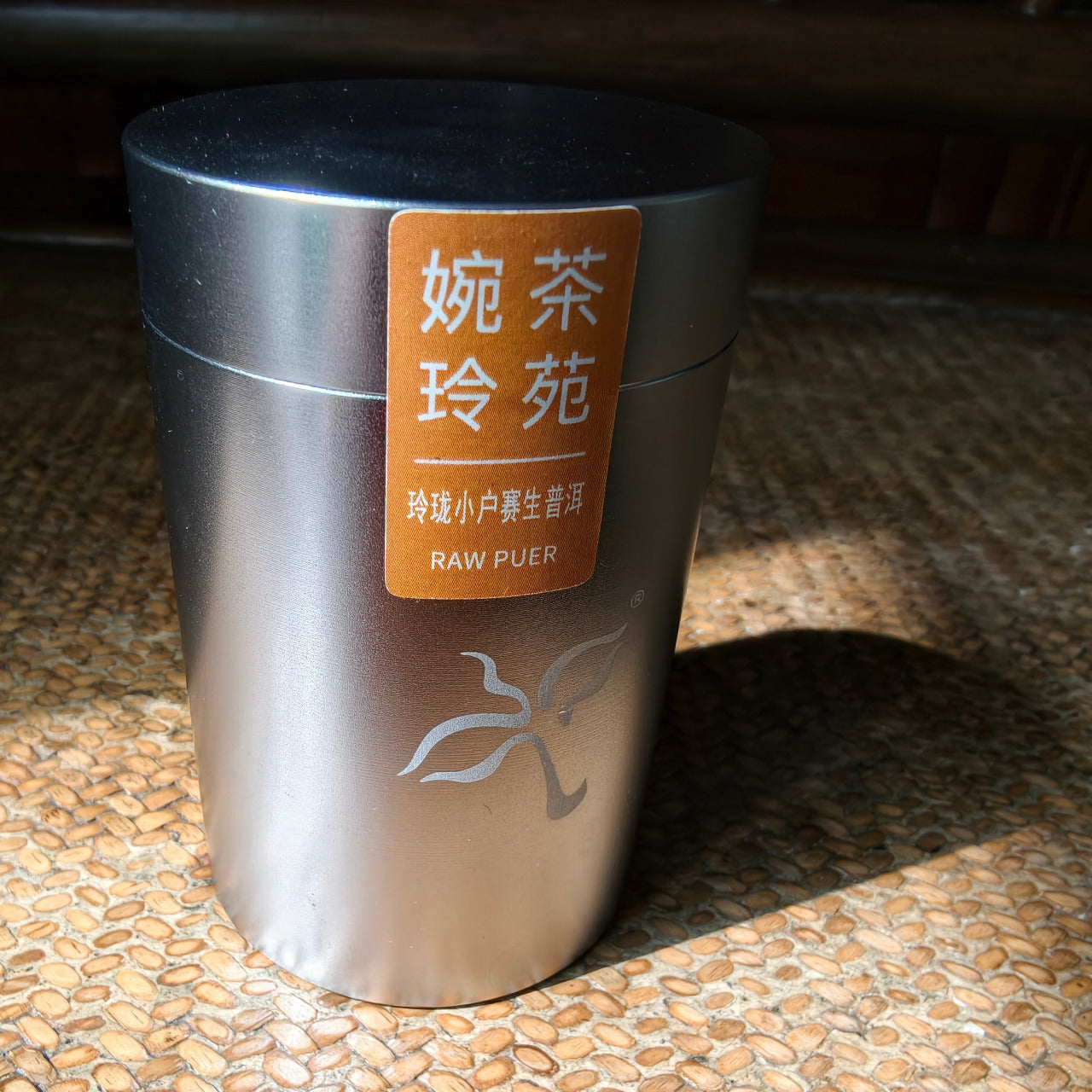 Mini Linglong Sheng Puerh Tea Cakes in a silver tin. Single origin raw puerh tea in convenient 6g mini-cakes.