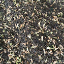Chinese black tea with pomelo flowers. Tea leaf is piled up with layers of flower that infuse their aroma into the tea.