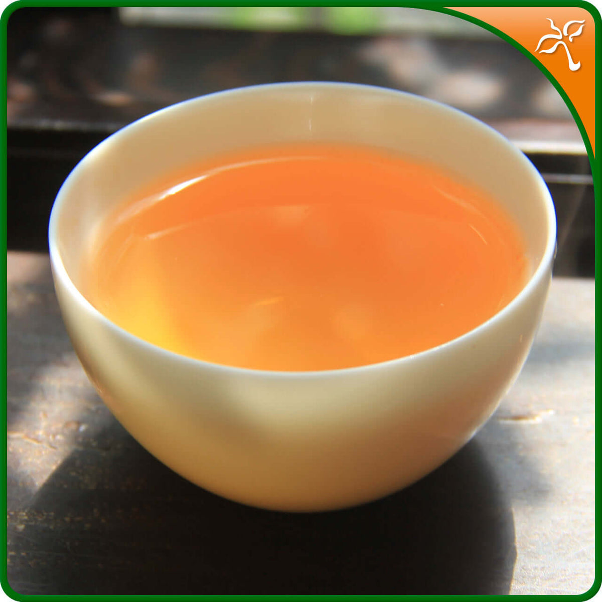 Sheng Puerh tea liquor. Single origin ancient tea tree Sheng Puerh from Xiao Hu Sai. Bright and clear tea.