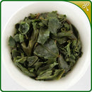 Guanyin Wang loose leaf brewed in a white ceramic gaiwan. 