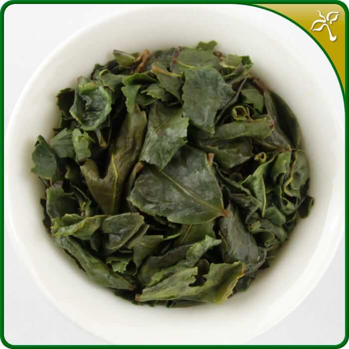 Guanyin Wang loose leaf brewed in a white ceramic gaiwan. 