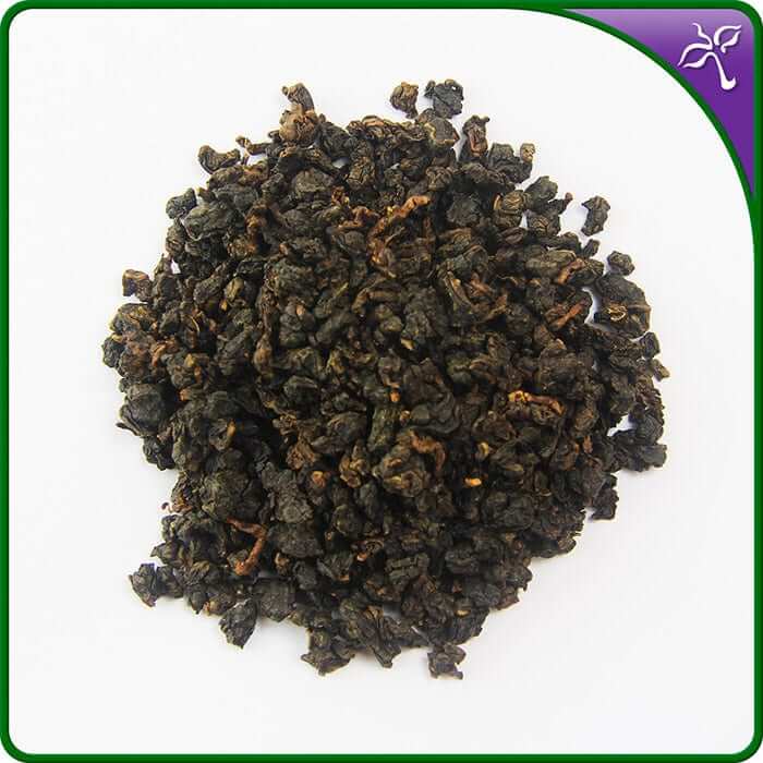 Close-up of dark, tightly rolled leaves of Bai Ya Qi Lan Oolong Tea on a white background.