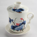 Lotus design tea mug set. Lidded tea mug with filter and saucer.